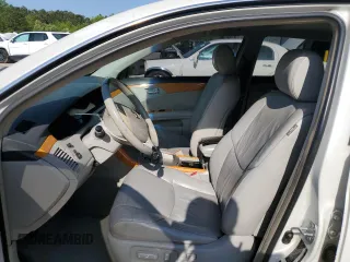 2007 Toyota Avalon XL z VIN 4T1BK36B87U251036, wystawiony jako Copart lot #52417095 z przebiegiem 218 502 mil mil oraz Szkoda całkowita • Salvage title. Historia ofert i sprzedaży dostępna na DreamBid. Obrazek 7.