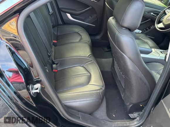 2013 Cadillac CTS Luxury z VIN 1G6DE5E52D0163844, wystawiony jako Copart lot #59255525 z przebiegiem 98 912 mil mil oraz Czysty tytuł • Clean title. Historia ofert i sprzedaży dostępna na DreamBid. Obrazek 6.