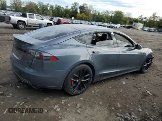 2014 Tesla Model S 60 with VIN 5YJSA1H14EFP28471, listed as a Copart auction lot 73715834 with 99,442 mi miles and Clean Title. Bid and sale history available at DreamBid. Image 3.