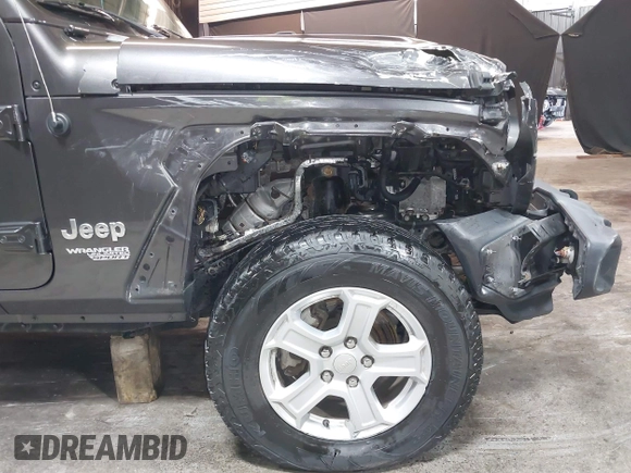 2018 Jeep Wrangler Unlimited Sport S with VIN 1C4HJXDG5JW126496, listed as a IAAI auction lot 42390584 with 163,476 mi miles and . Bid and sale history available at DreamBid. Image 12.