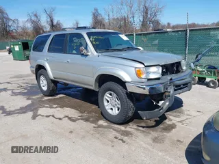 2001 Toyota 4Runner SR5 z VIN JT3HN86R310335218, wystawiony jako IAAI lot #41880232 z przebiegiem 218 491 mil mil oraz . Historia ofert i sprzedaży dostępna na DreamBid. Obrazek 1.