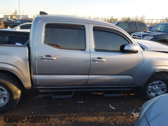 2021 Toyota Tacoma SR z VIN 3TMCZ5AN5MM386394, wystawiony jako IAAI lot #41821364 z przebiegiem 54 070 mil mil oraz . Historia ofert i sprzedaży dostępna na DreamBid. Obrazek 14.
