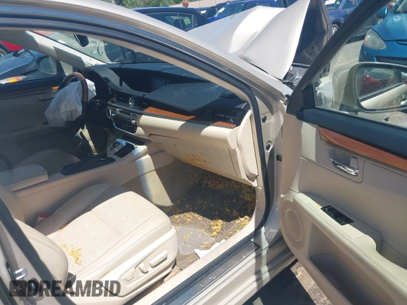 2013 Lexus ES 300h z VIN JTHBW1GG9D2012639, wystawiony jako IAAI lot #42157365 z przebiegiem 102 070 mil mil oraz . Historia ofert i sprzedaży dostępna na DreamBid. Obrazek 5.