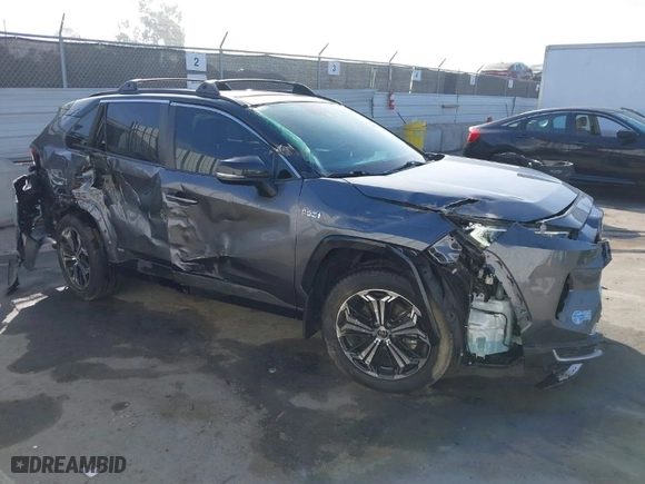 2021 Toyota RAV4 Prime XSE with VIN JTMFB3FV7MD009740, listed as a IAAI auction lot 41666510 with 59,950 mi miles. Bid and sale history available at carsss.com. Image 1.