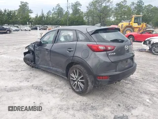 2017 Mazda CX-3 Touring z VIN JM1DKDC7XH0173046, wystawiony jako IAAI lot #42378951 z przebiegiem 223 122 mil mil oraz . Historia ofert i sprzedaży dostępna na DreamBid. Obrazek 3.
