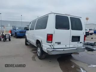 2011 Ford Econoline Passenger XL with VIN 1FBNE3BL2BDB02920, listed as a IAAI auction lot 41621713 with 270,140 mi miles. Bid and sale history available at carsss.com. Image 3.