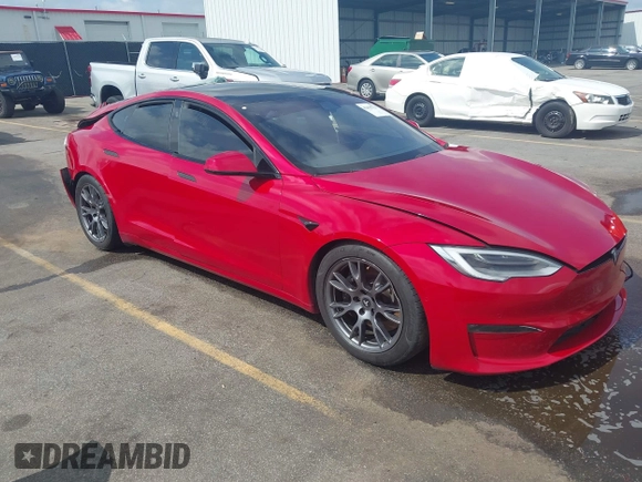 2021 Tesla Model S Plaid z VIN 5YJSA1E69MF439987, wystawiony jako IAAI lot #42496725 z przebiegiem 25 mil mil oraz . Historia ofert i sprzedaży dostępna na DreamBid. Obrazek 1.