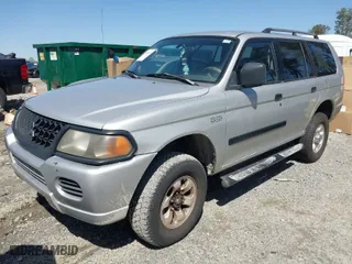 2002 Mitsubishi Montero Sport ES with VIN JA4LS21H92P009565, listed as a IAAI auction lot 41886037 with 208,950 mi miles. Bid and sale history available at carsss.com. Image 2.