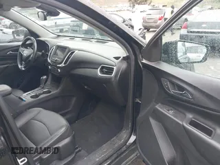 2020 Chevrolet Equinox LT with VIN 2GNAXLEX0L6174015, listed as a IAAI auction lot 41900966 with 144,116 mi miles. Bid and sale history available at carsss.com. Image 5.