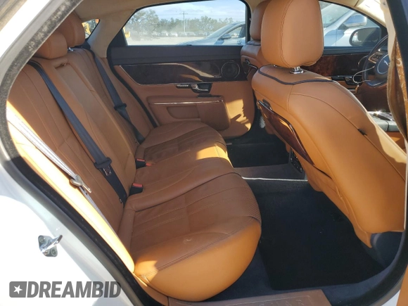 2013 Jaguar XJ Supercharged with VIN SAJWA2GE3DMV45811, listed as a Copart auction lot 76585864 with 53,570 mi miles and Salvage title. Bid and sale history available at DreamBid. Image 10.