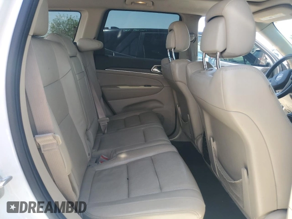 2014 Jeep Grand Cherokee Limited with VIN 1C4RJFBT2EC471846, listed as a Copart auction lot 63637415 with 130,262 mi miles and Salvage title. Bid and sale history available at DreamBid. Image 11.