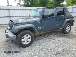 2007 Jeep Wrangler Unlimited X with VIN 1J4GA39117L119395, listed as a Copart auction lot 52588055 with 160,335 mi miles and Salvage title. Bid and sale history available at DreamBid. Image 1.