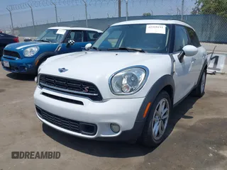 2016 MINI Countryman S with VIN WMWZC3C51GWT10248, listed as a IAAI auction lot 42359191 with 77,157 mi miles and . Bid and sale history available at DreamBid. Image 2.