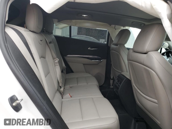 2021 Cadillac XT4 FWD Luxury z VIN 1GYAZAR48MF018135, wystawiony jako Copart lot #43023665 z przebiegiem 54 271 mil mil oraz Szkoda całkowita • Salvage title. Historia ofert i sprzedaży dostępna na DreamBid. Obrazek 11.