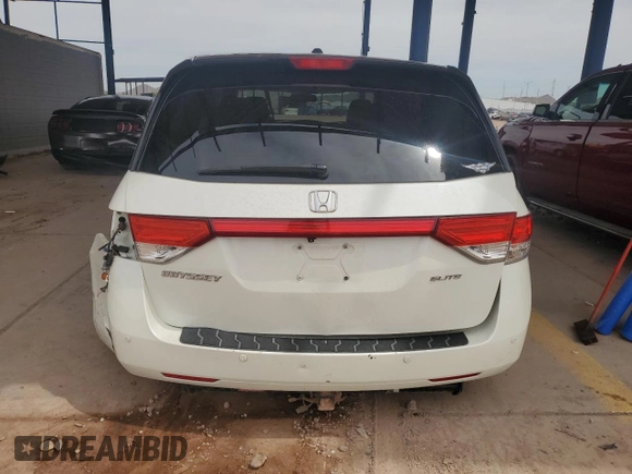 2017 Honda Odyssey Touring with VIN 5FNRL5H94HB007979, listed as a Copart auction lot 56755435 with 125,821 mi miles and Salvage title. Bid and sale history available at DreamBid. Image 6.