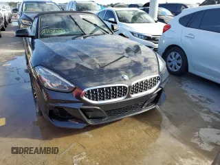 2020 BMW Z4 sDrive30i with VIN WBAHF3C06LWW75400, listed as a Copart auction lot 74297024 with 34,559 mi miles and Salvage Title. Bid and sale history available at carsss.com. Image 5.
