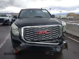 2019 GMC Yukon XL SLT with VIN 1GKS1GKC7KR155668, listed as a IAAI auction lot 41751792 with 163,537 mi miles. Bid and sale history available at carsss.com. Image 13.