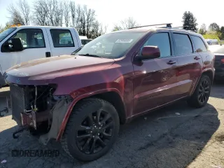 2018 Jeep Grand Cherokee Laredo E with VIN 1C4RJFAG1JC130386, listed as a Copart auction lot 52999085 with 69,304 mi miles and Salvage Title. Bid and sale history available at DreamBid. Image 1.