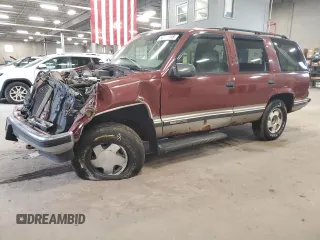 1998 GMC Yukon z VIN 1GKEK13R4WJ704953, wystawiony jako Copart lot #52570345 z przebiegiem 184 964 mil mil oraz Szkoda całkowita • Salvage title. Historia ofert i sprzedaży dostępna na DreamBid. Obrazek 1.