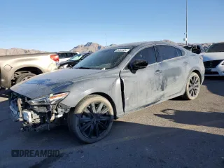 2021 Mazda 6 Carbon Edition with VIN JM1GL1WY0M1610974, listed as a Copart auction lot 84961604 with 55,107 mi miles and Salvage Title. Bid and sale history available at DreamBid. Image 1.