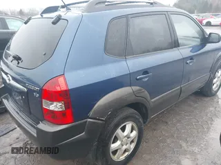 2005 Hyundai Tucson GLS with VIN KM8JN12DX5U134859, listed as a IAAI auction lot 41126546 with 215,110 mi miles. Bid and sale history available at carsss.com. Image 4.