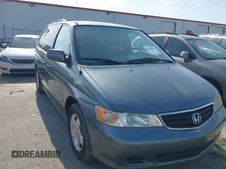 2001 Honda Odyssey EX z VIN 2HKRL18601H532141, wystawiony jako IAAI lot #41981052 z przebiegiem 126 931 mil mil oraz . Historia ofert i sprzedaży dostępna na DreamBid. Obrazek 14.