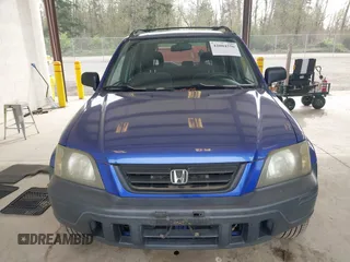 2001 Honda CR-V LX with VIN JHLRD28451C005857, listed as a IAAI auction lot 42004556 with 211,403 mi miles. Bid and sale history available at carsss.com. Image 12.