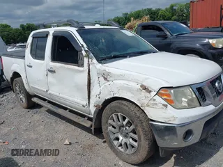 2009 Nissan Frontier SE z VIN 1N6AD07U19C427701, wystawiony jako IAAI lot #42613374 z przebiegiem 164 412 mil mil oraz . Historia ofert i sprzedaży dostępna na DreamBid. Obrazek 1.