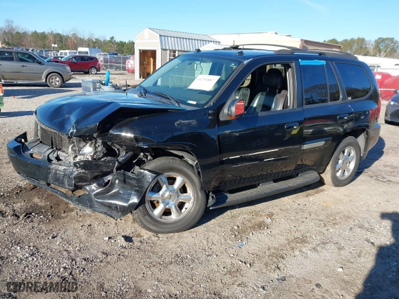 2005 GMC Envoy SLE with VIN 1GKDS13S152246568, listed as a IAAI auction lot 41293887 with 315,882 mi miles. Bid and sale history available at carsss.com. Image 17.