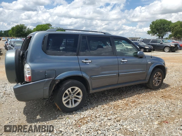 2005 Suzuki XL7 LX z VIN JS3TY92VX54102488, wystawiony jako Copart lot #56700595 z przebiegiem 169 827 mil mil oraz Szkoda całkowita • Salvage title. Historia ofert i sprzedaży dostępna na DreamBid. Obrazek 3.