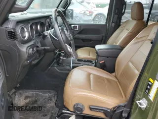2023 Jeep Wrangler Sahara with VIN 1C4JJXP61PW528948, listed as a Copart auction lot 46866885 with 38,191 mi miles and Clean Title. Bid and sale history available at DreamBid. Image 7.
