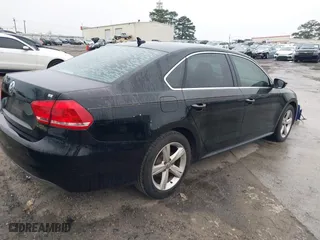 2012 Volkswagen Passat SE with VIN 1VWBP7A3XCC049552, listed as a IAAI auction lot 41627827 with 196,428 mi miles. Bid and sale history available at carsss.com. Image 4.