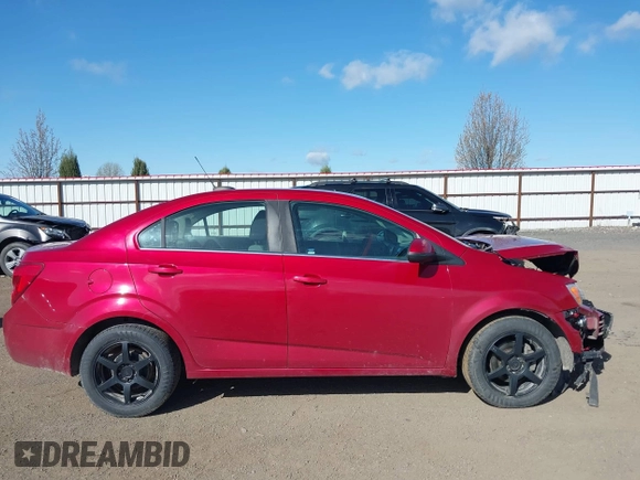2015 Chevrolet Sonic LT with VIN 1G1JC5SH8F4182004, listed as a IAAI auction lot 41993900 with 73,359 mi miles and . Bid and sale history available at DreamBid. Image 13.