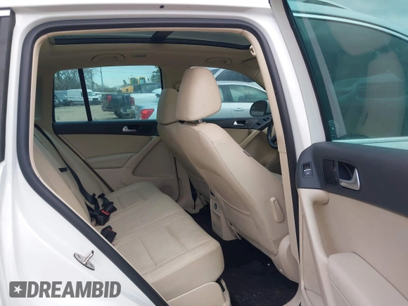 2017 Volkswagen Tiguan Wolfsburg Edition with VIN WVGRV7AX5HK019734, listed as a IAAI auction lot 41391911 with 123,005 mi miles and . Bid and sale history available at DreamBid. Image 8.