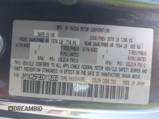 2006 Mazda MX-5 Miata Touring z VIN JM1NC25F960112536, wystawiony jako IAAI lot #41868290 z przebiegiem 153 162 mil mil oraz . Historia ofert i sprzedaży dostępna na DreamBid. Obrazek 9.