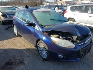 2012 Ford Focus SEL with VIN 1FAHP3M21CL145245, listed as a IAAI auction lot 41320151 with 85,630 mi miles. Bid and sale history available at carsss.com. Image 1.