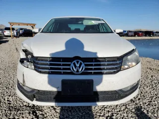 2014 Volkswagen Passat SEL Premium z VIN 1VWCN7A30EC100232, wystawiony jako Copart lot #48228355 z przebiegiem 127 832 mil mil oraz Szkoda całkowita • Salvage title. Historia ofert i sprzedaży dostępna na DreamBid. Obrazek 5.
