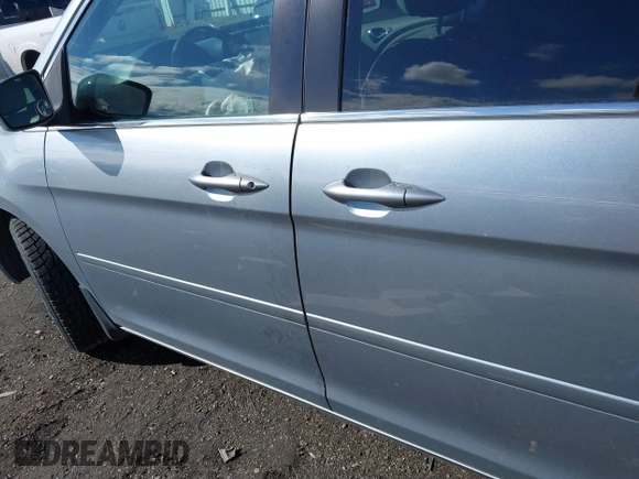 2007 Honda Odyssey EX with VIN 5FNRL384X7B119757, listed as a IAAI auction lot 41809763 with 163,526 mi miles and . Bid and sale history available at DreamBid. Image 14.