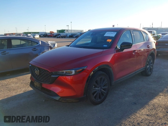2022 Mazda CX-5 2.5 Turbo with VIN JM3KFBAY4N0564000, listed as a IAAI auction lot 41076013 with 25,106 mi miles and . Bid and sale history available at carsss.com. Image 17.