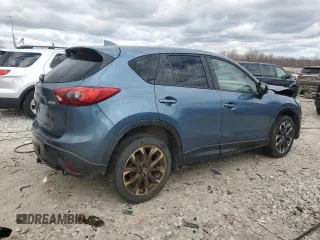 2016 Mazda CX-5 Grand Touring z VIN JM3KE4DY2G0637779, wystawiony jako Copart lot #52001805 z przebiegiem 184 381 mil mil oraz Czysty tytuł • Clean title. Historia ofert i sprzedaży dostępna na DreamBid. Obrazek 3.