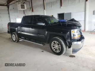 2018 Chevrolet Silverado 1500 LT with VIN 3GCUKREC2JG345482, listed as a Copart auction lot 52452445 with 100,824 mi miles and Salvage Title. Bid and sale history available at DreamBid. Image 4.