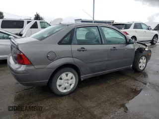 2007 Ford Focus S z VIN 1FAHP34N27W144992, wystawiony jako Copart lot #65571385 z przebiegiem 194 933 mil mil oraz Szkoda całkowita • Salvage title. Historia ofert i sprzedaży dostępna na DreamBid. Obrazek 3.