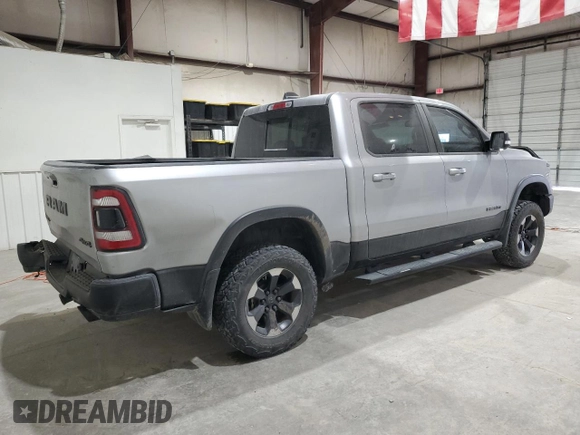 2019 Ram 1500 Rebel z VIN 1C6SRFLT3KN671103, wystawiony jako Copart lot #49518485 z przebiegiem 134 232 mil mil oraz Czysty tytuł • Clean title. Historia ofert i sprzedaży dostępna na DreamBid. Obrazek 3.
