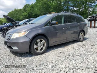 2012 Honda Odyssey Touring с VIN 5FNRL5H92CB042433, выставлен на аукционе Copart как лот 60632085 с пробегом 183 542 миль миль и Чистый • Clean title. История ставок и продаж доступна на DreamBid. Изображение 1.