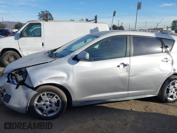 2010 Pontiac Vibe w/1SB with VIN 5Y2SP6E08AZ411868, listed as a IAAI auction lot 41146998 with 154,943 mi miles. Bid and sale history available at carsss.com. Image 6.