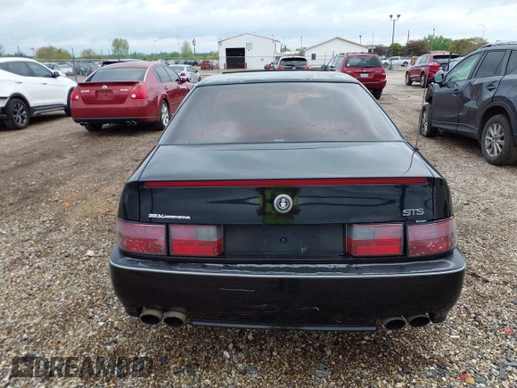 1994 Cadillac Seville STS z VIN 1G6KY5296RU823387, wystawiony jako IAAI lot #42151901 z przebiegiem 165 918 mil mil oraz . Historia ofert i sprzedaży dostępna na DreamBid. Obrazek 17.