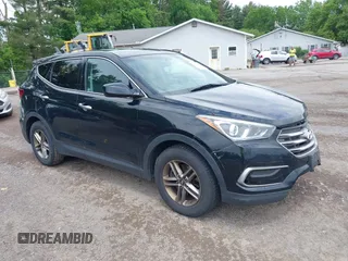 2017 Hyundai Santa Fe 2.4L z VIN 5XYZTDLBXHG431230, wystawiony jako IAAI lot #42302492 z przebiegiem 185 291 mil mil oraz . Historia ofert i sprzedaży dostępna na DreamBid. Obrazek 1.