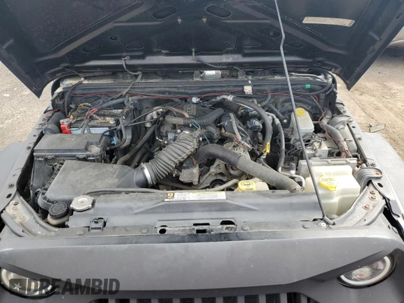 2009 Jeep Wrangler X with VIN 1J4FA24159L743572, listed as a Copart auction lot 63623425 with 138,964 mi miles and Clean title. Bid and sale history available at DreamBid. Image 12.