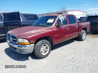 2000 Dodge Dakota Sport with VIN 1B7GL2AX7YS677544, listed as a IAAI auction lot 41965480 with 236,552 mi miles. Bid and sale history available at carsss.com. Image 2.