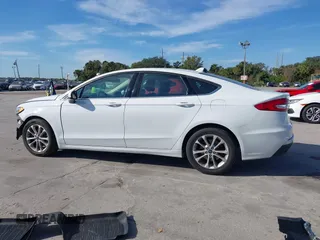 2019 Ford Fusion SE with VIN 3FA6P0H76KR261861, listed as a IAAI auction lot 41031650 with 132,040 mi miles. Bid and sale history available at carsss.com. Image 15.
